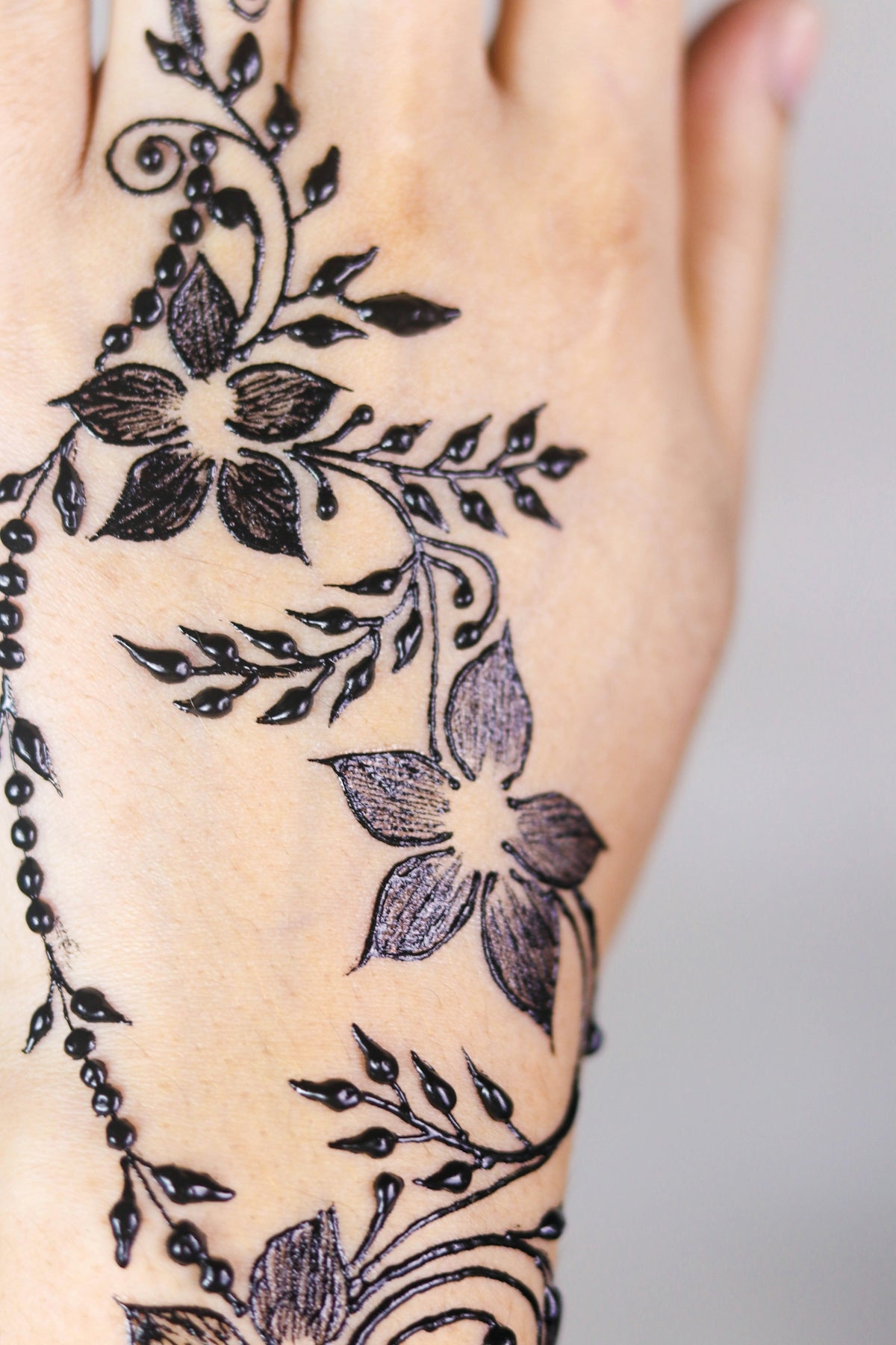 tattoo in hand close-up photography