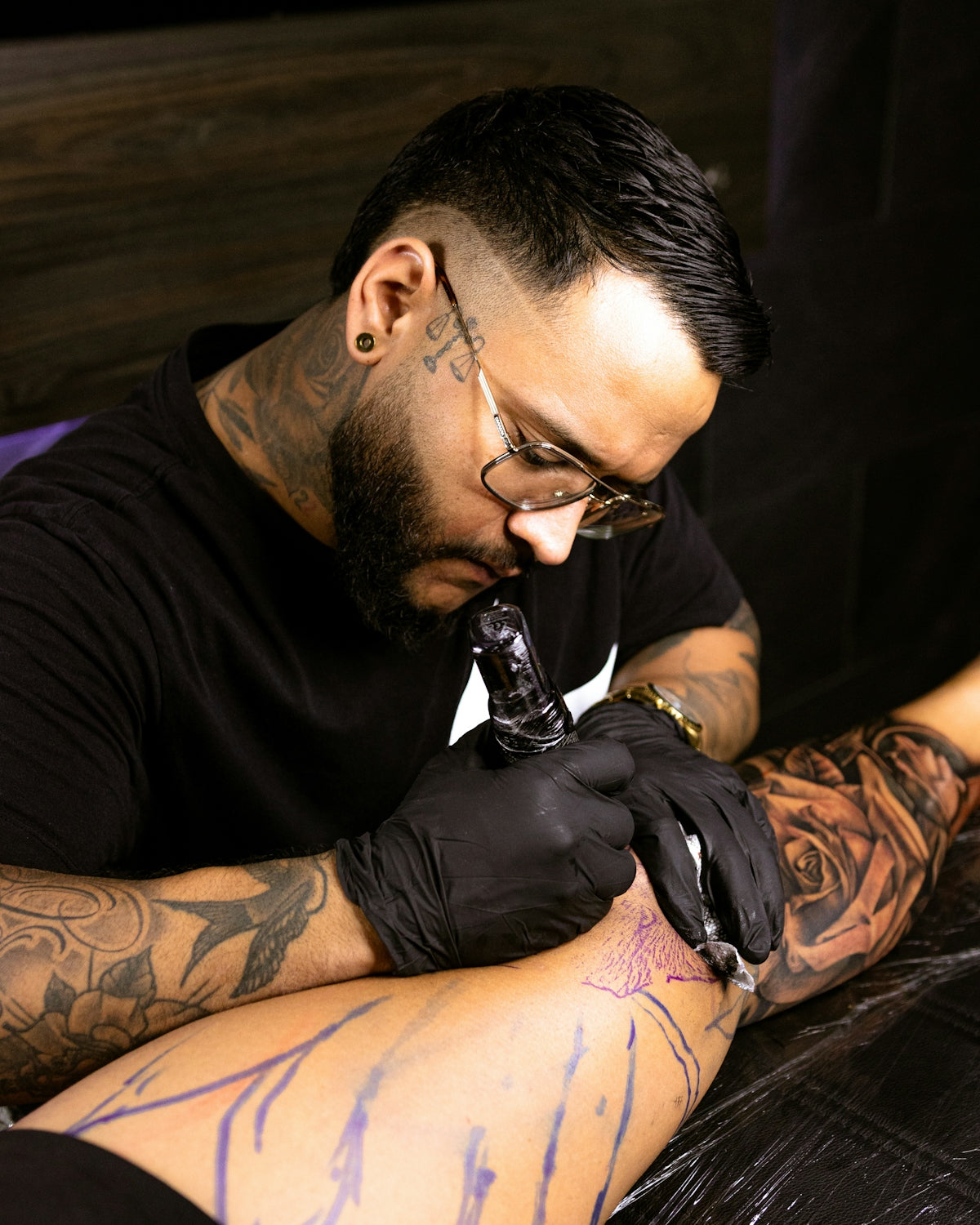 a man with a tattoo on his arm