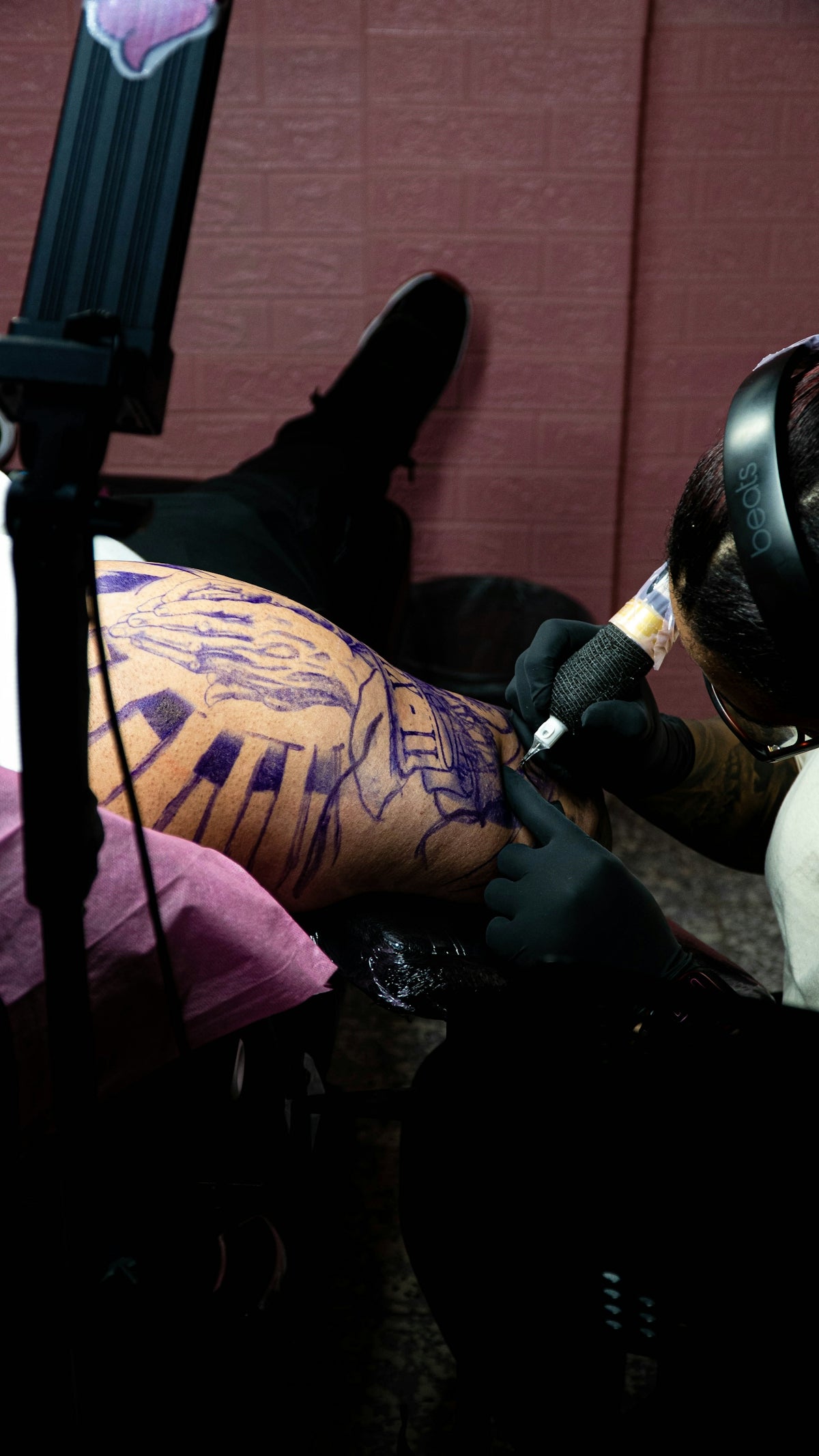 a man with a tattoo on his leg