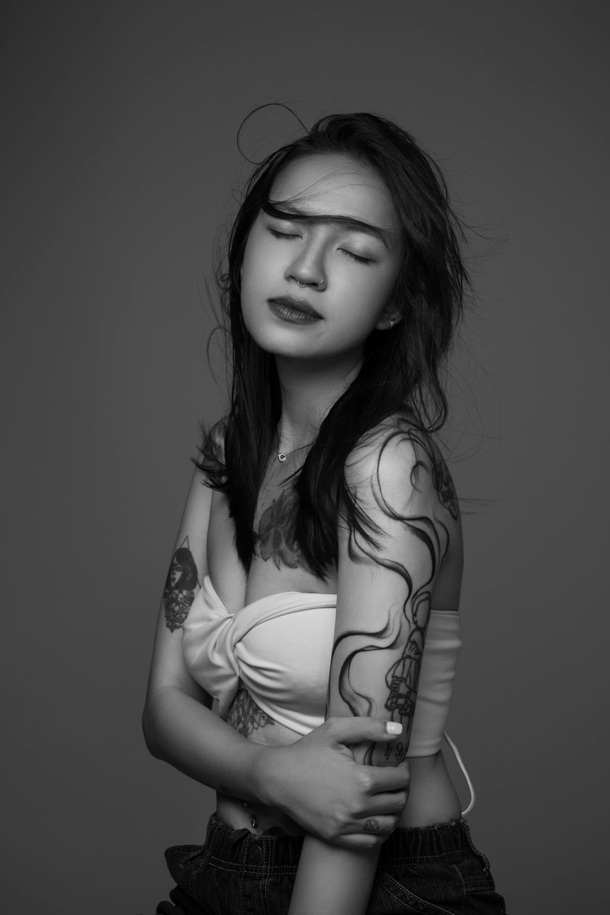 A woman with a tattoo on her arm
