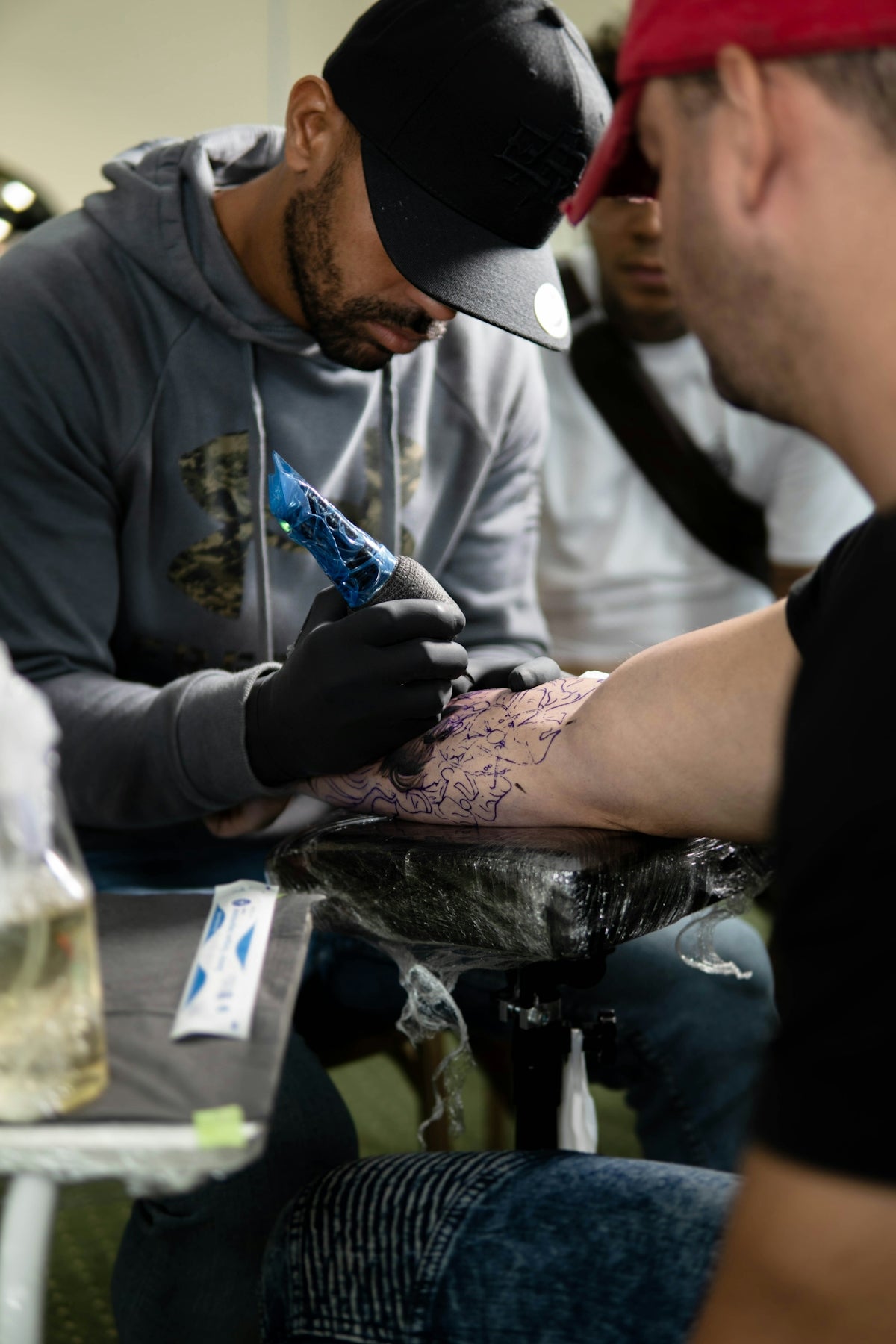 a man getting a tattoo